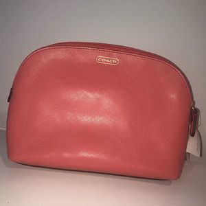 NWT Coach salmon colored mini bag